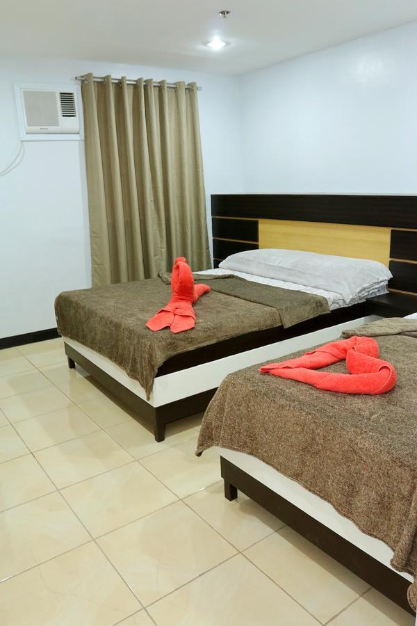 Global 88 Apartelle Cebu Esterno foto