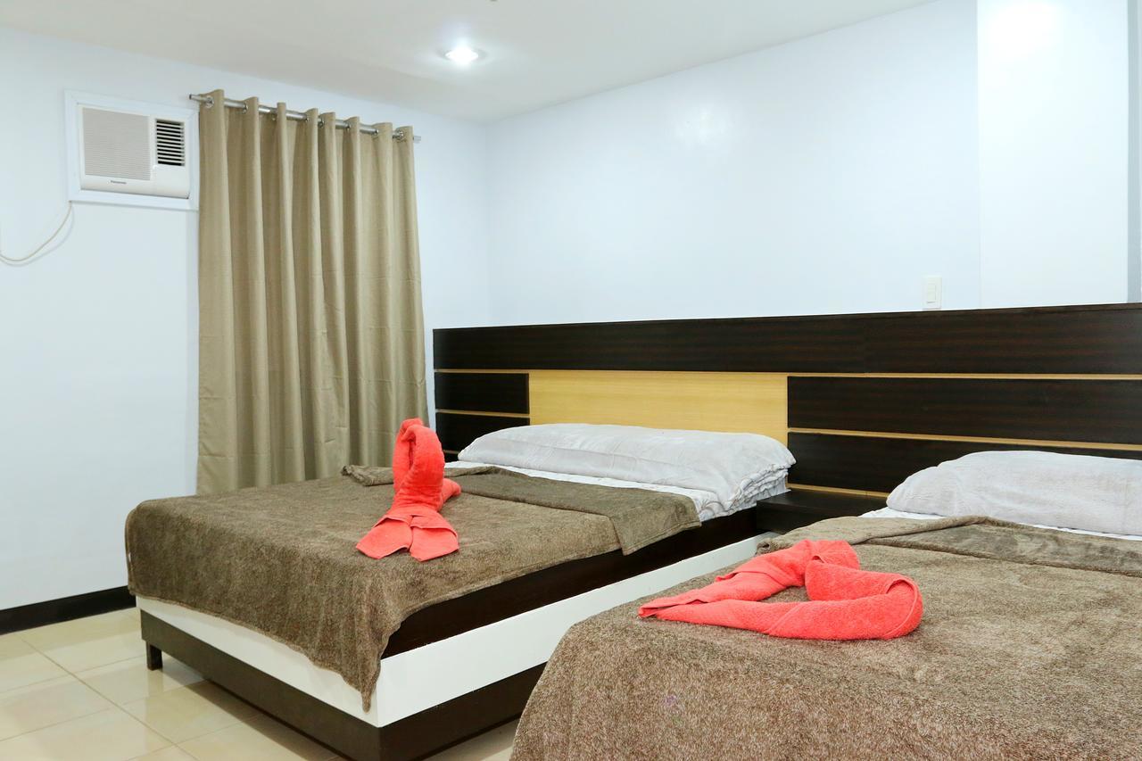 Global 88 Apartelle Cebu Esterno foto
